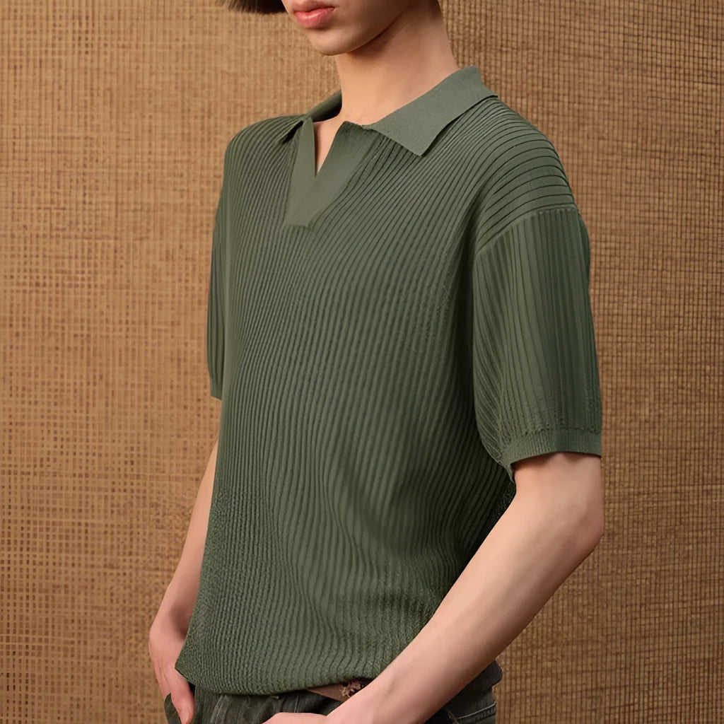 Man wearing a creamy-white loose-fit polo shirt with a striped collar, short sleeves, for summer business casual wear.