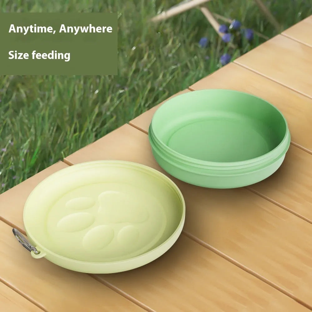 Portable dog bowl with snack box compartment in two-tone light green colour