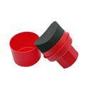 Black and red tyre polishing sponge brushes with PP handles and protective lids on a garage worktop