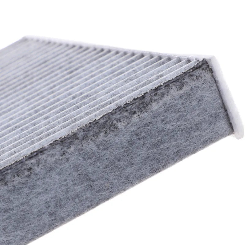 Grey air conditioning filter element for Geely cars, measuring 215mm by 210mm.