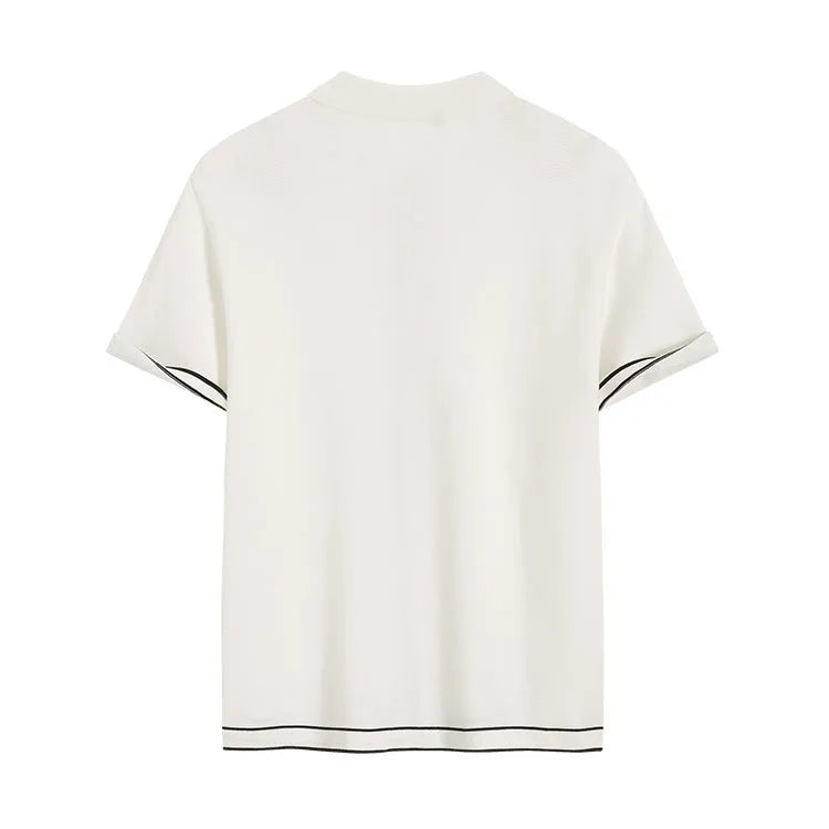White short sleeve cardigan with dark contrast trim on the lapels.
