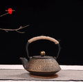 Japanese cast iron teapot with 0.9L capacity showing decorative Bronze finish