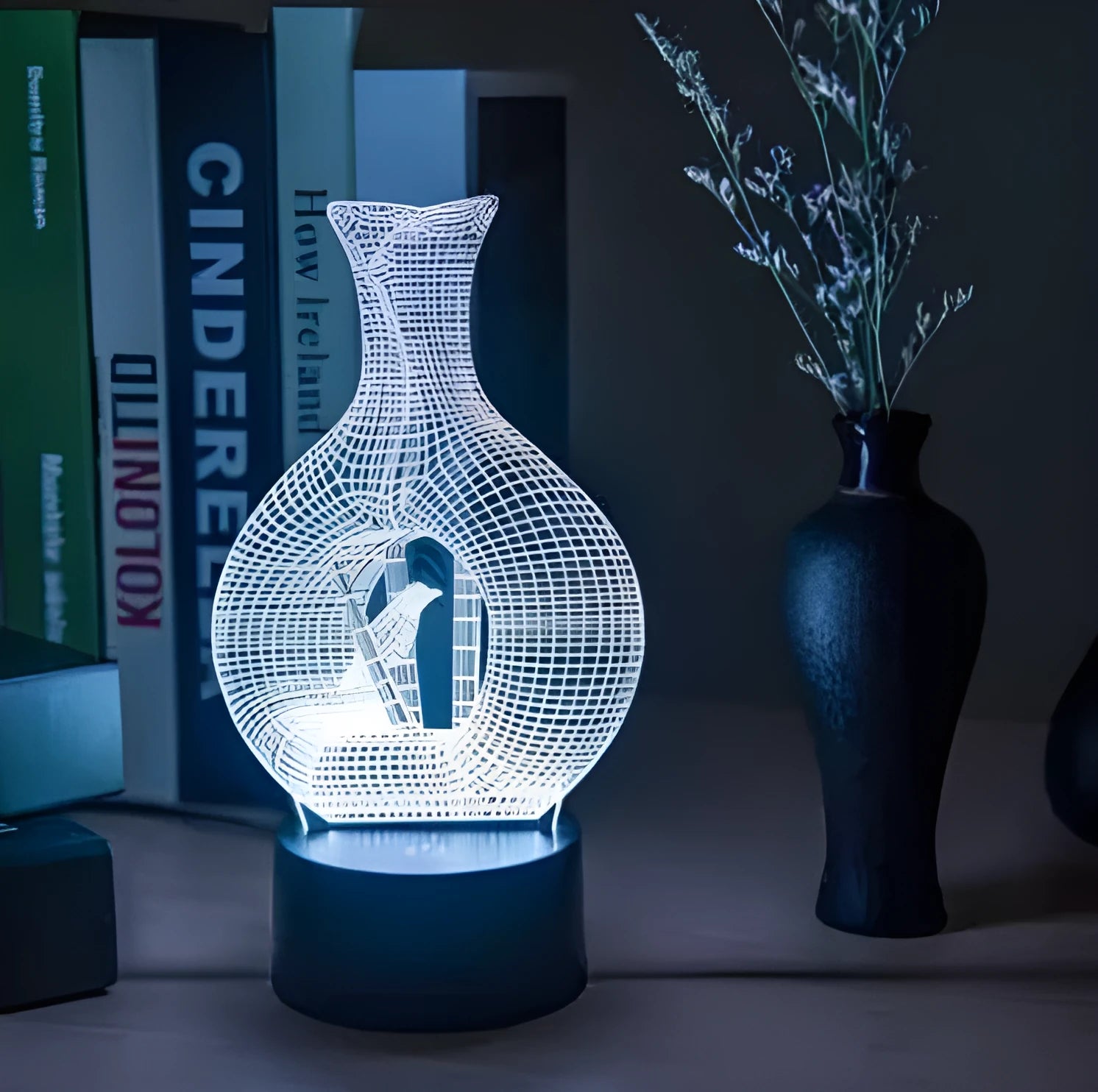 3D acrylic LED night light with touch button on ABS base, showing multi-colour illumination.
