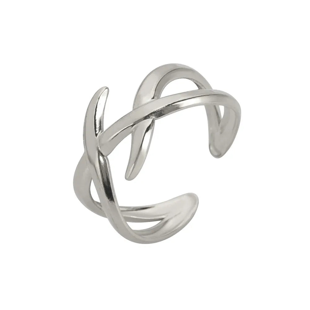 Retro women's stainless steel open ring in gold colour with adjustable opening on white background
