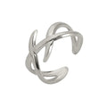 Retro women's stainless steel open ring in gold colour with adjustable opening on white background