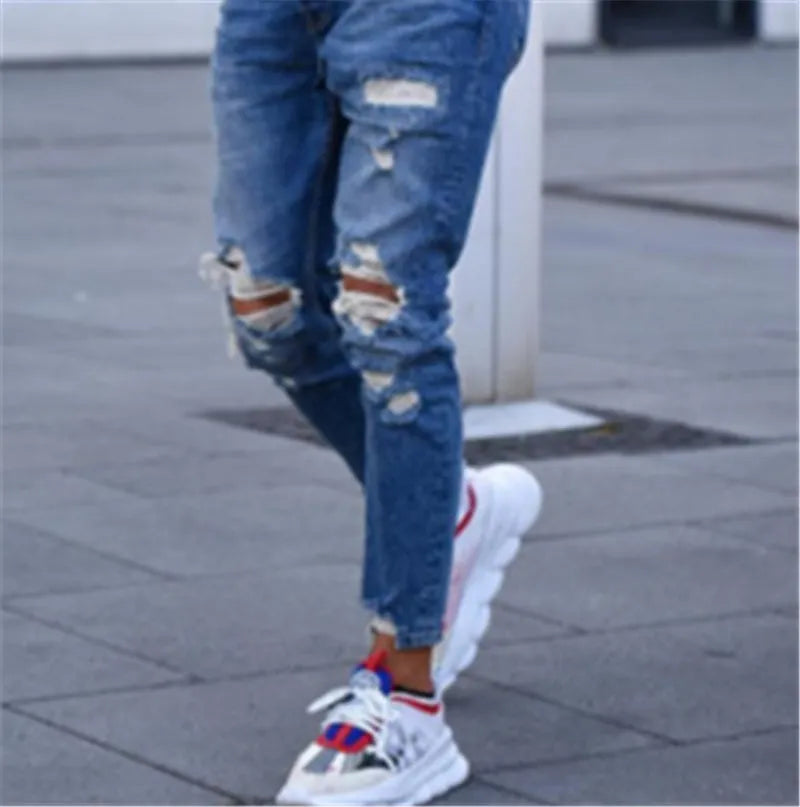 Men's deep blue cotton jeans showing front view with traditional five-pocket design