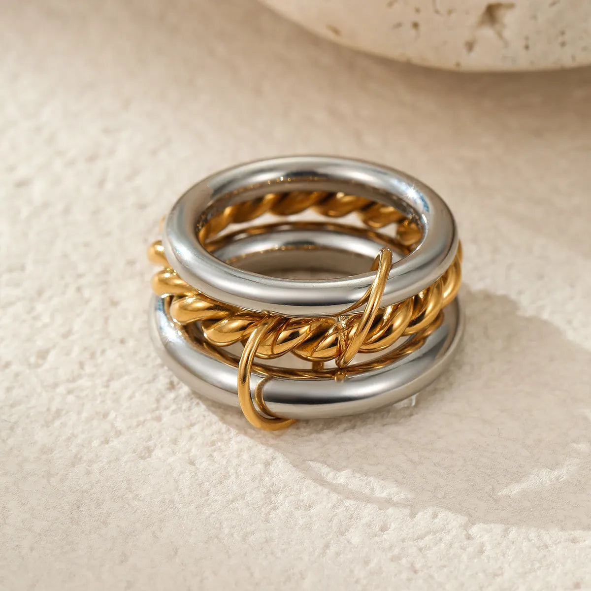 Stacked stainless steel rings with 18K gold plating in colour-matched set for women