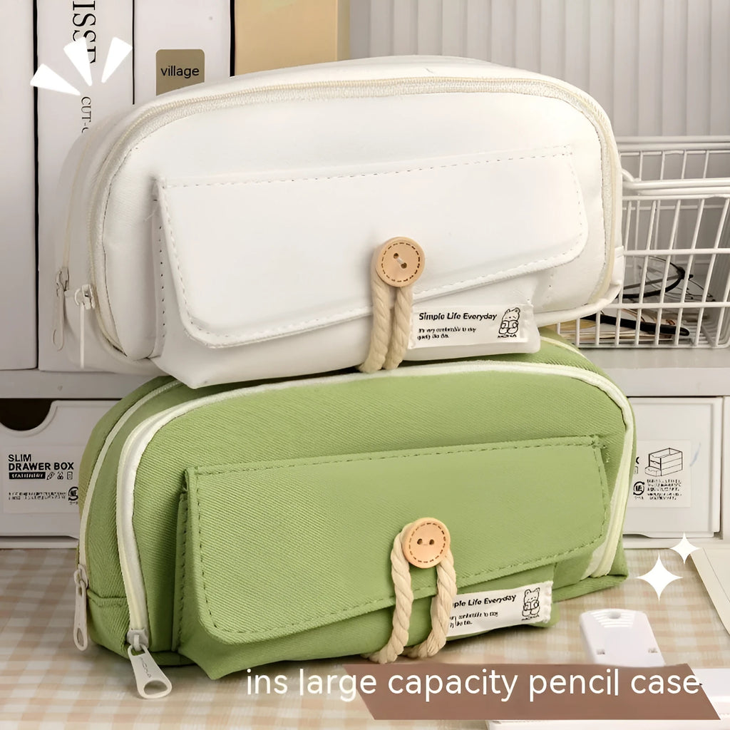 Korean-style canvas pencil case with button closure storing approximately 80 pens