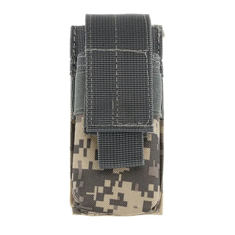 MOLLE-compatible tactical waist bag in black nylon with elastic cord buckle, shown on a belt.