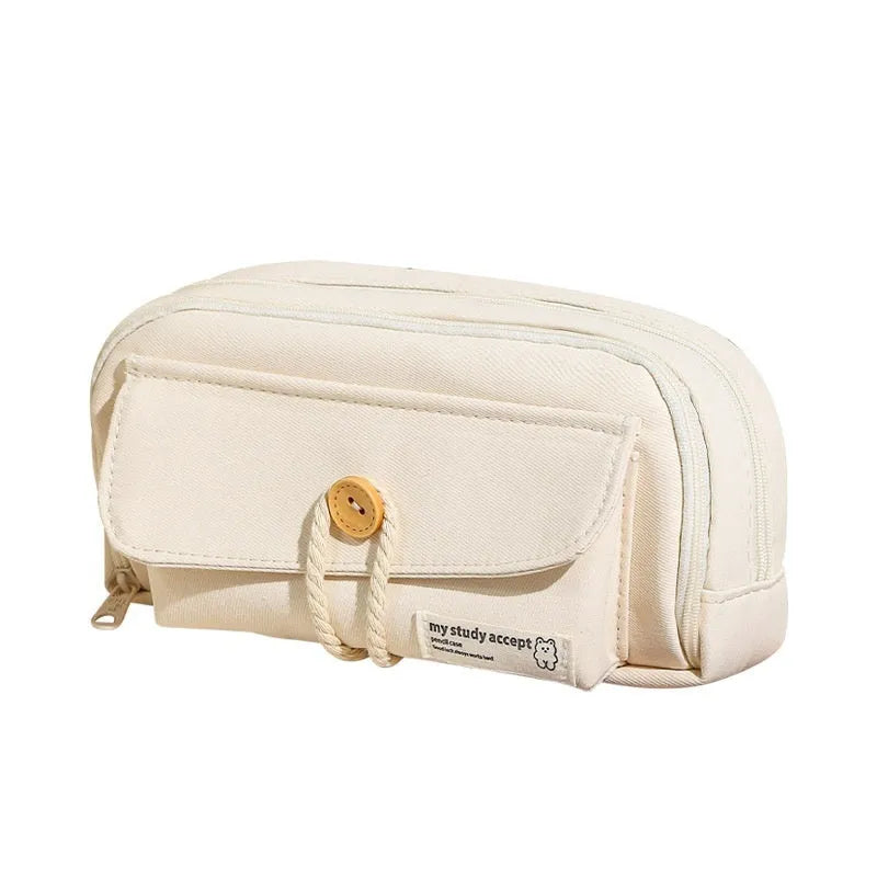 Korean-style canvas pencil case with button closure storing approximately 80 pens