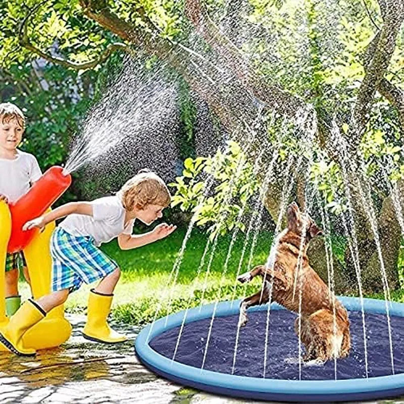 Blue anti-slip dog splash pad sprinkler toy with water sprays, placed on grass.