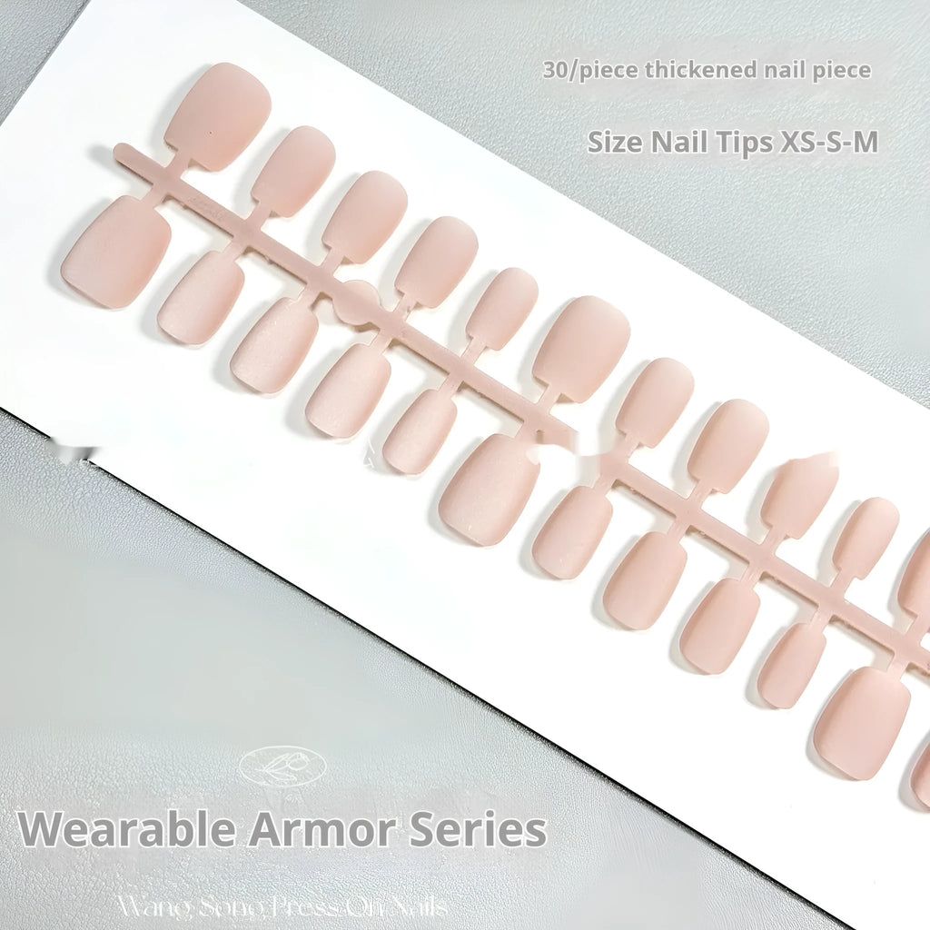 Frosted Velvet Cat's Eye false nail set showing Aurora armour design on short ladder shaped nails in sizes XS, S, and M.