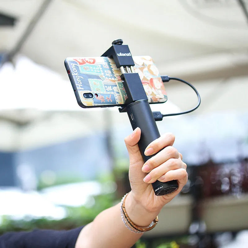 Black aluminium alloy portable power bank with a carrying handle, showing front and side views.