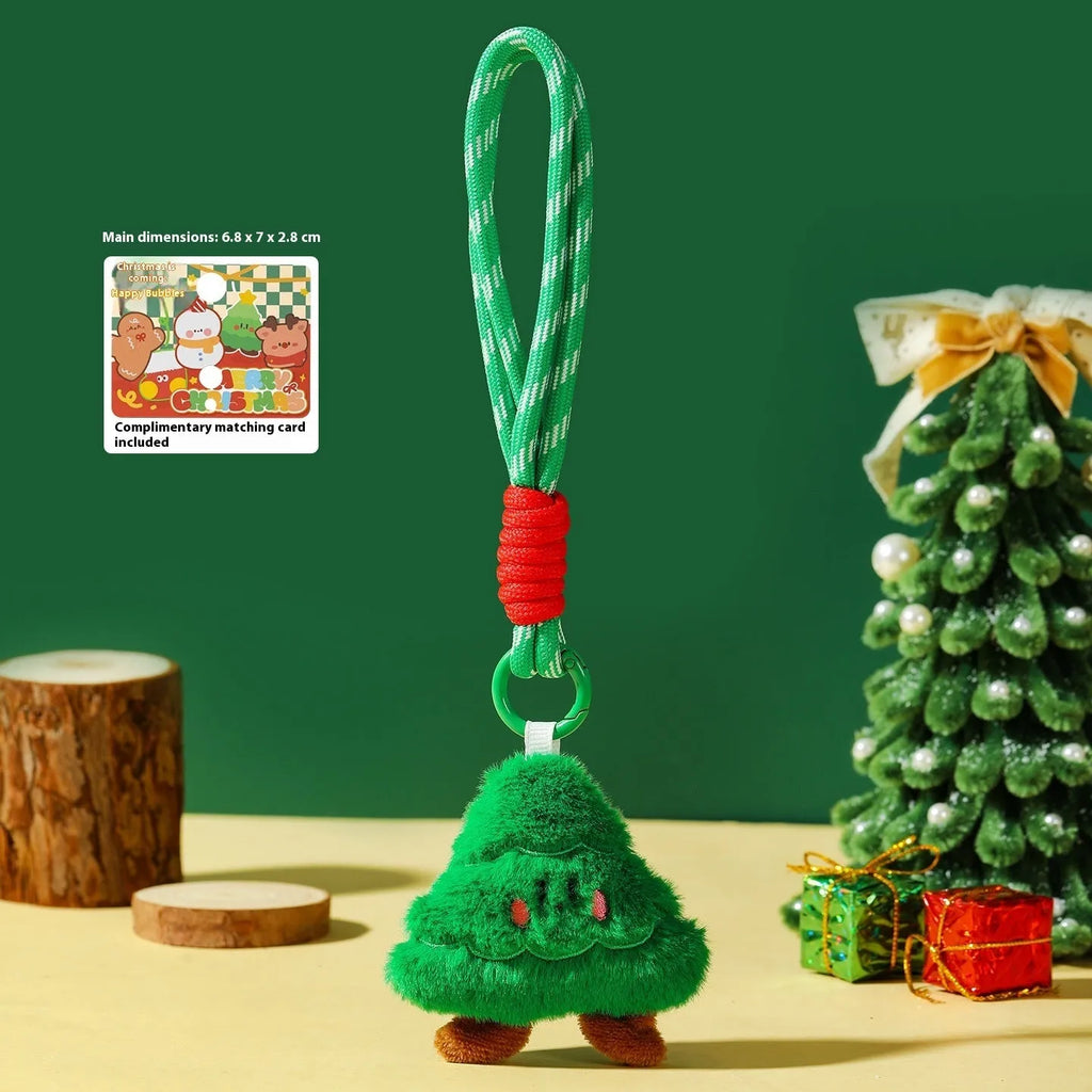 Set of eight Christmas plush pendant keychains in cartoon designs including Santa Claus, snowman, gingerbread man, Christmas tree, and more