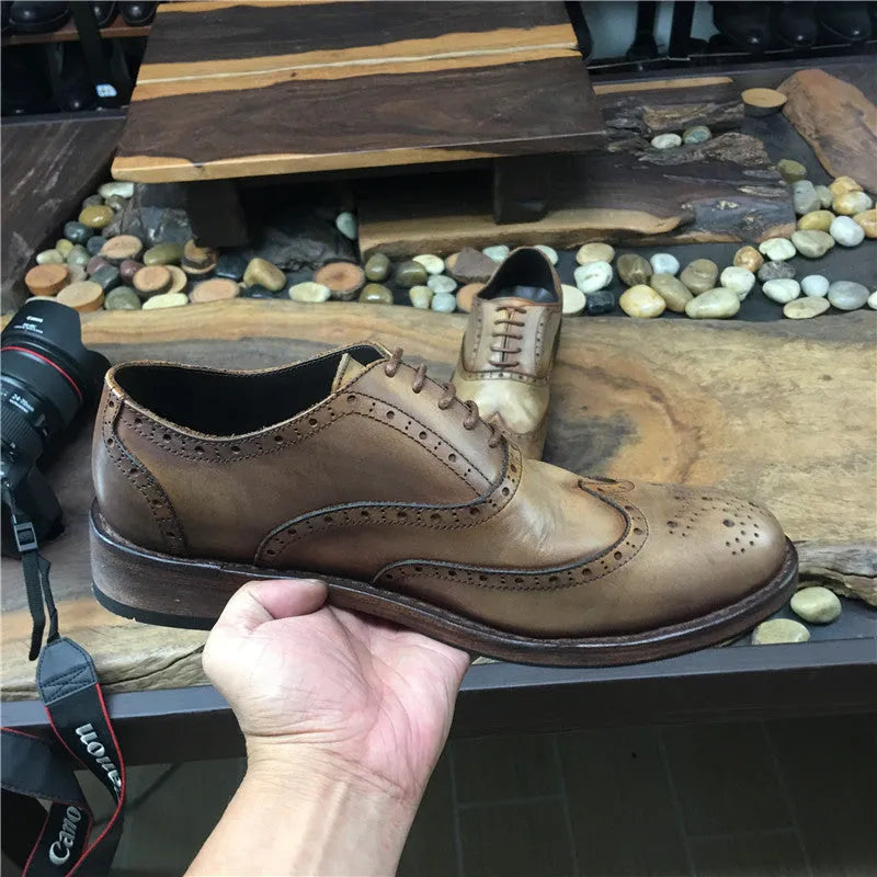 Light brown men's distressed leather casual shoes with lace-up closure and round toe.