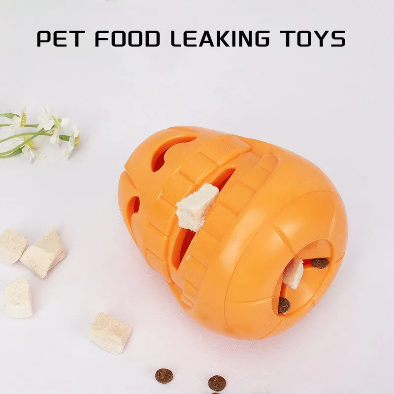 Orange Halloween pumpkin shaped dog chew toy with a funnel opening for treats.