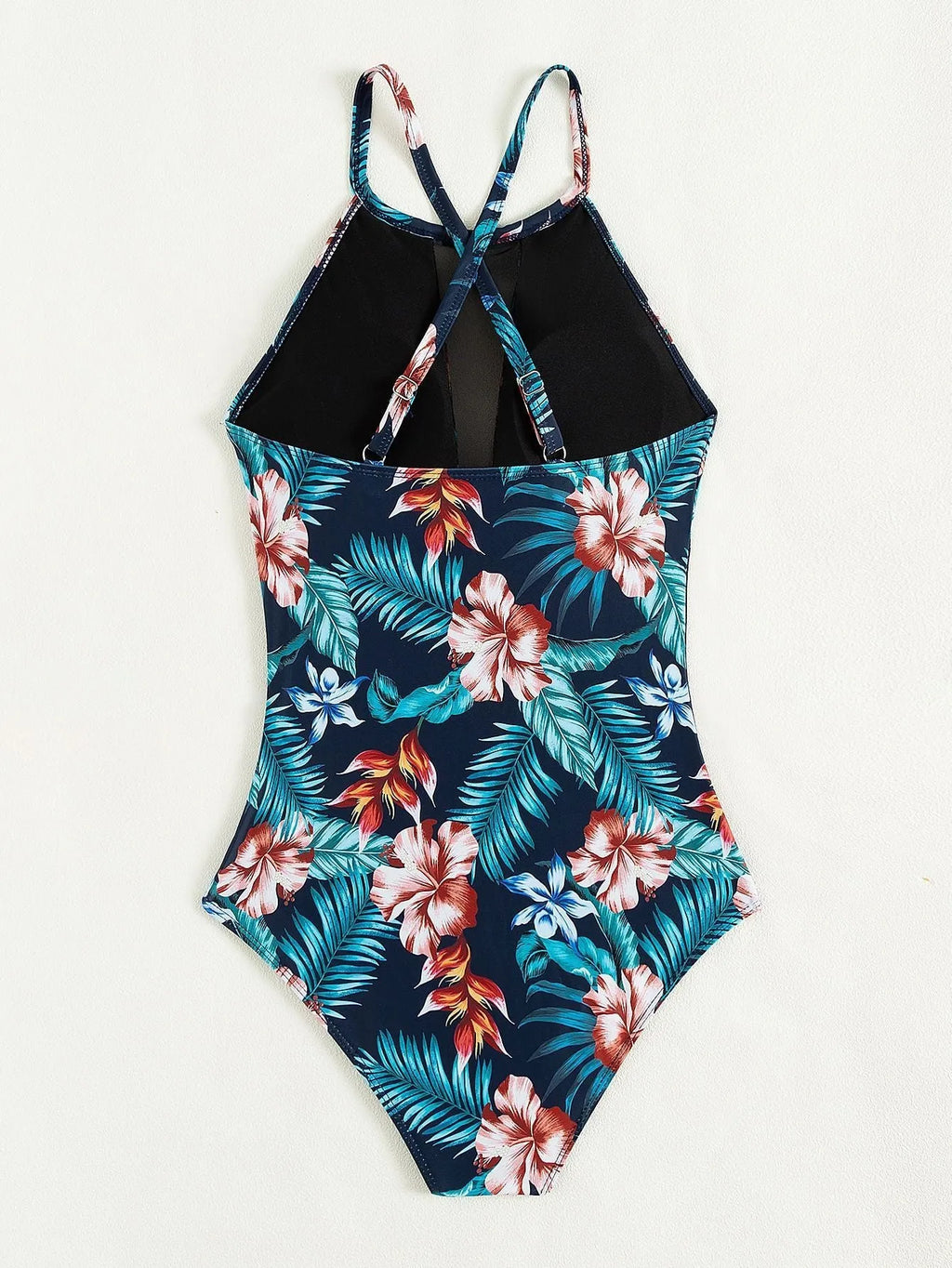 Women's deep V-neck one-piece swimsuit in a printed gradient pattern, showing European/American fit.