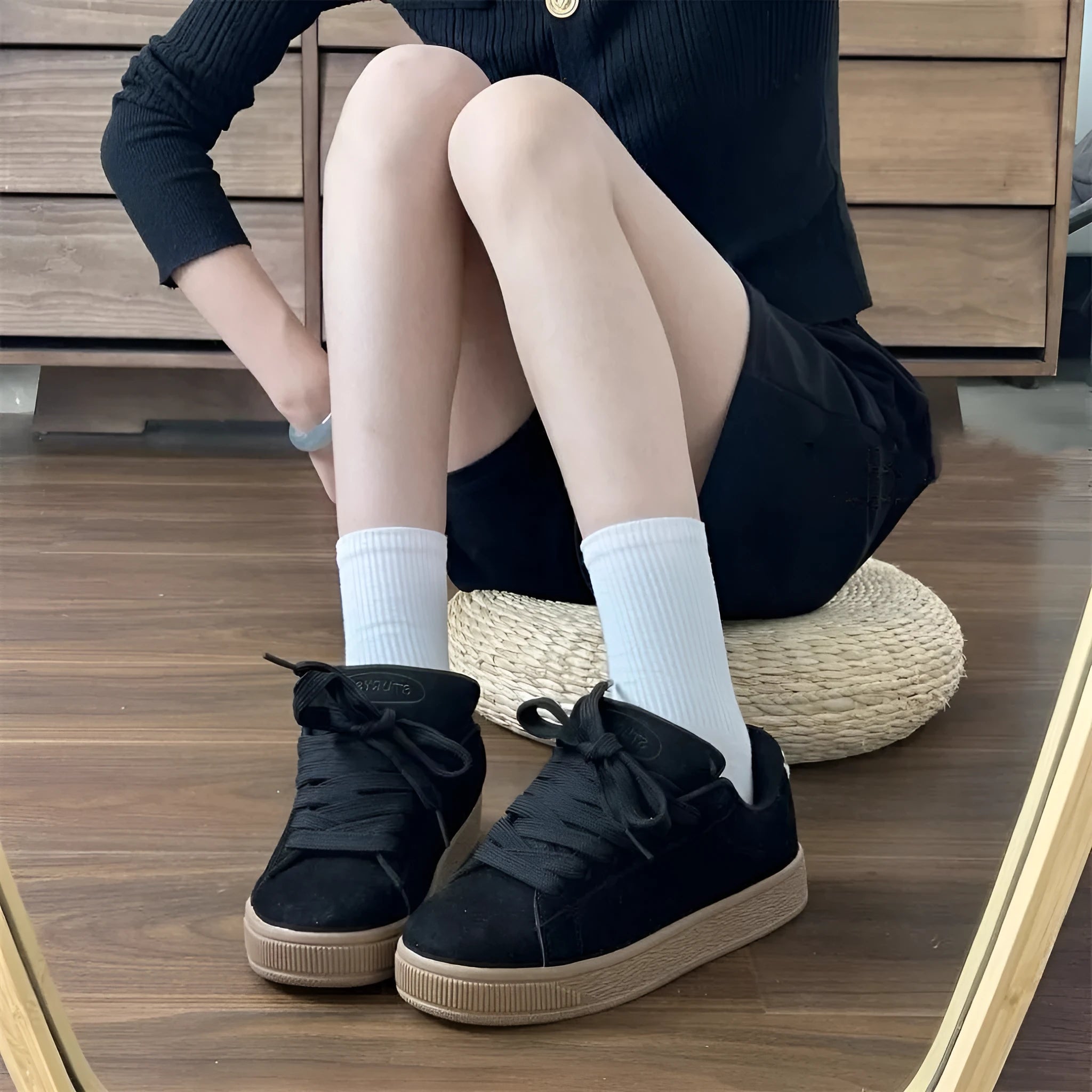 Black retro low-top sneakers with waterproof platform, round toe, and lace-up closure for men and women