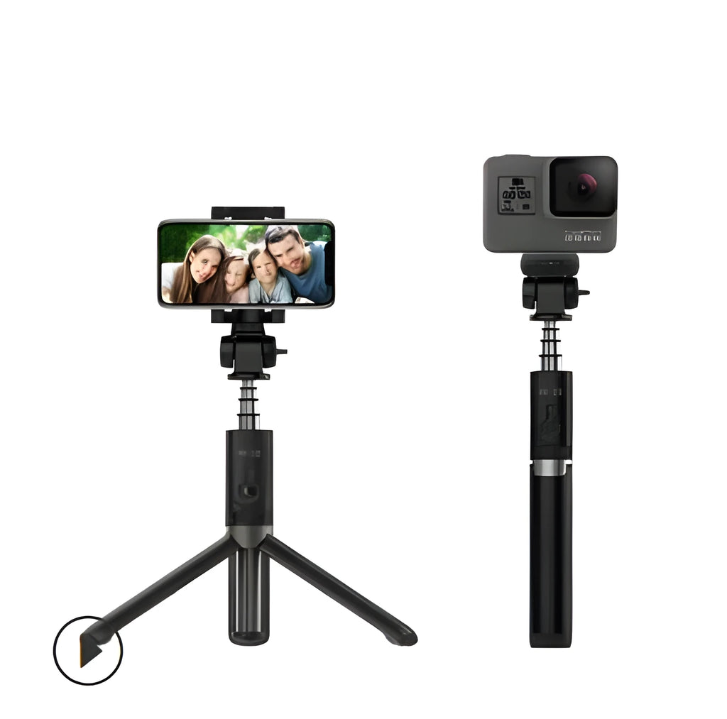 Black Bluetooth selfie stick tripod with remote control extended, holding a smartphone