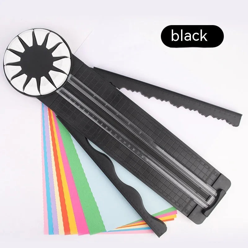 Pink plastic paper cutting machine with 12 pattern functions measuring 46.2 cm long