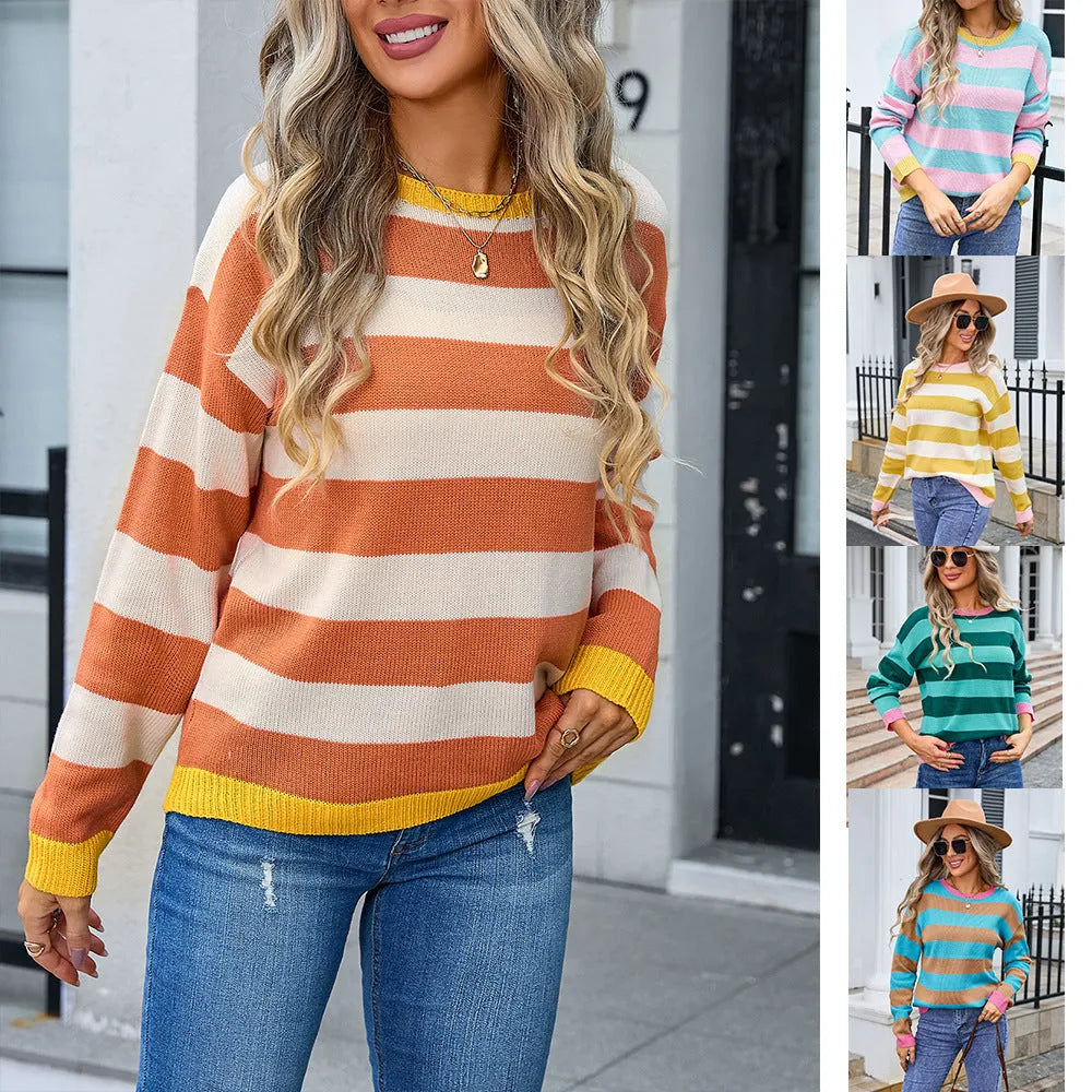 Women's loose blue striped acrylic long sleeve round neck sweater on a hanger