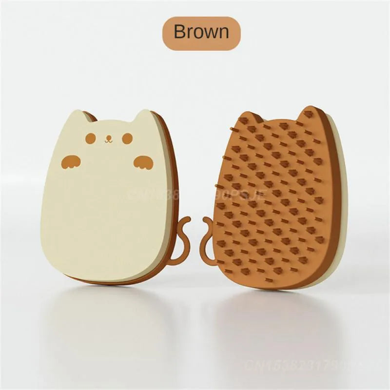 Blue silicone pet comb with sponge head for static adsorption of cat and dog hair.