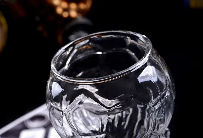 Transparent Hercules-themed glass beer cup with 450ml capacity, 6cm diameter, and 19cm height on a table