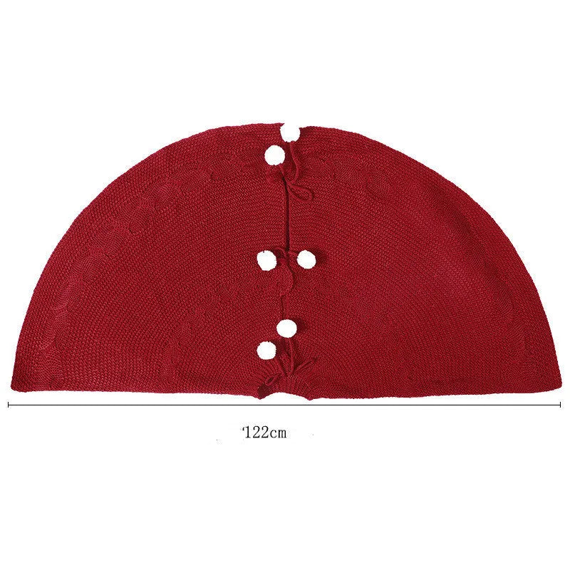 Wine red acrylic Christmas tree skirt 120cm diameter on floor under tree base
