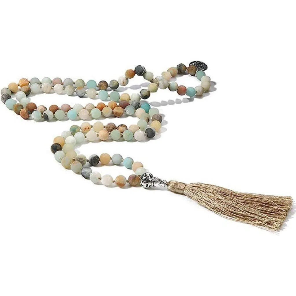 Handmade knotted beaded necklace with 108 natural stone beads in a simple geometric style on a white background