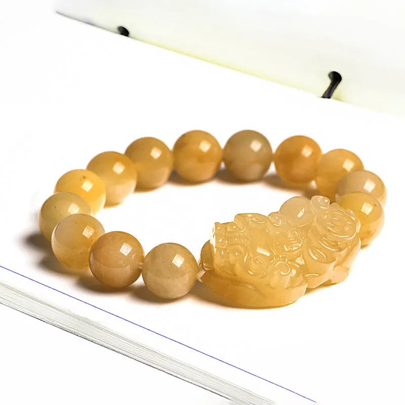 Golden thread Jinsi jade money bracelet with carved beads, shown in large and small size options.