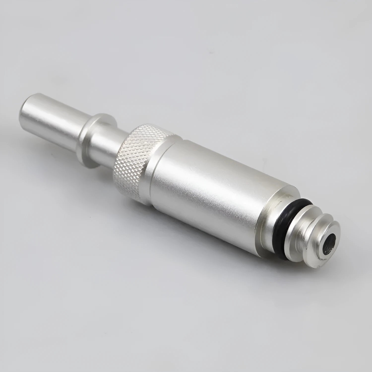 Silver metal transmission refuelling joint for VAS6262-9 diagnostic equipment.