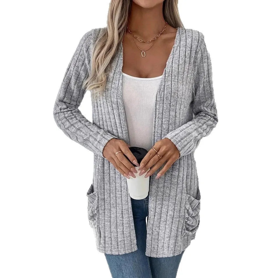 Men's solid colour long sleeve cardigan with front pockets in loose fit polyester knitwear