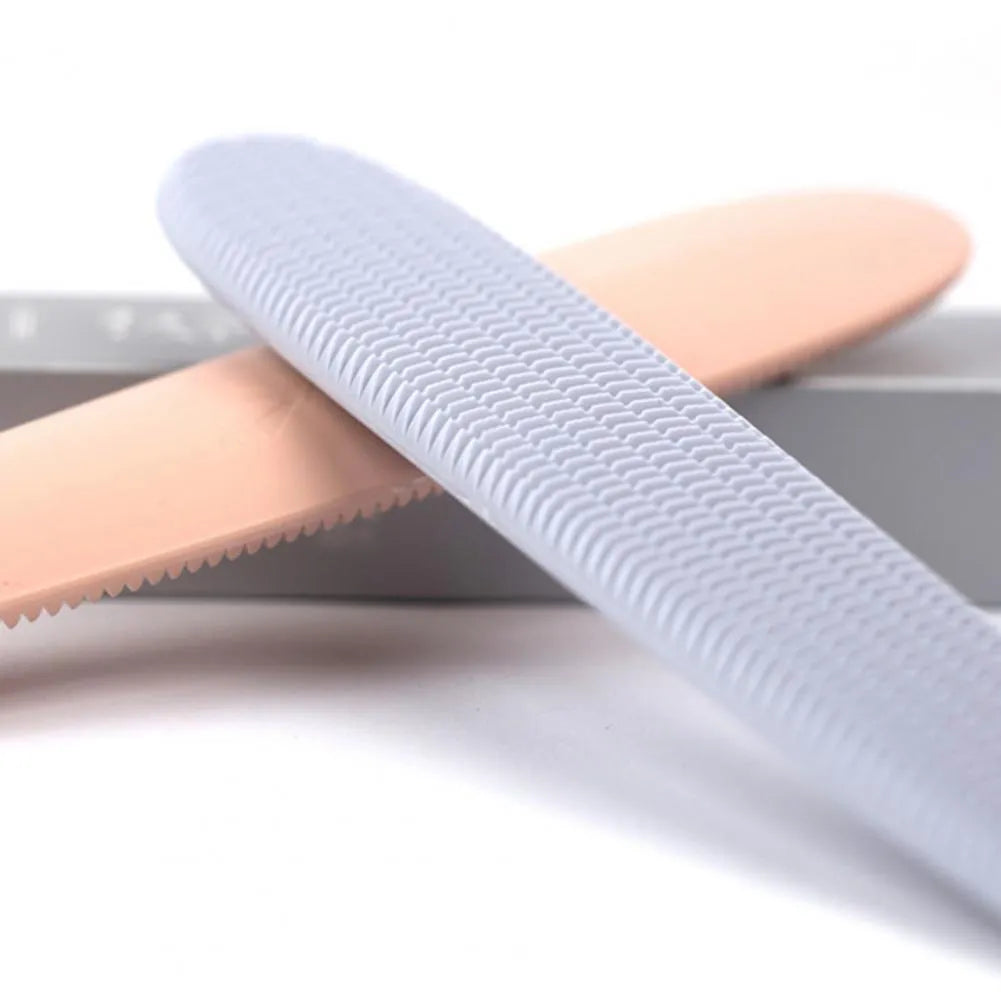 Gray and pink cat comb with tongue-massage design for pet hair removal