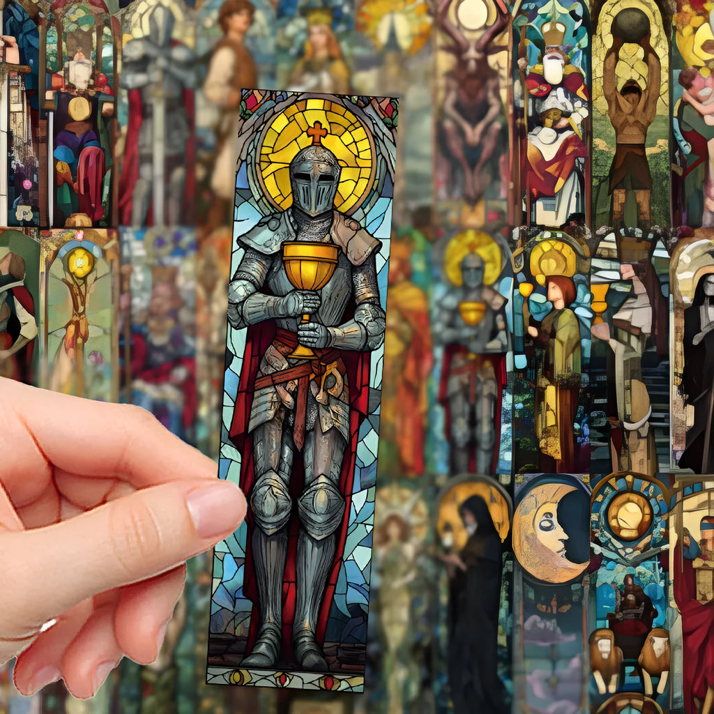 Set of 30 painted glass tarot bookmarks with cute artwork on paper, laid out flat.