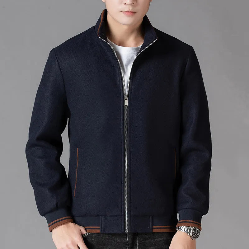 Men's grey polyester fleece sports jacket with long sleeves and a pocket, shown on a hanger.