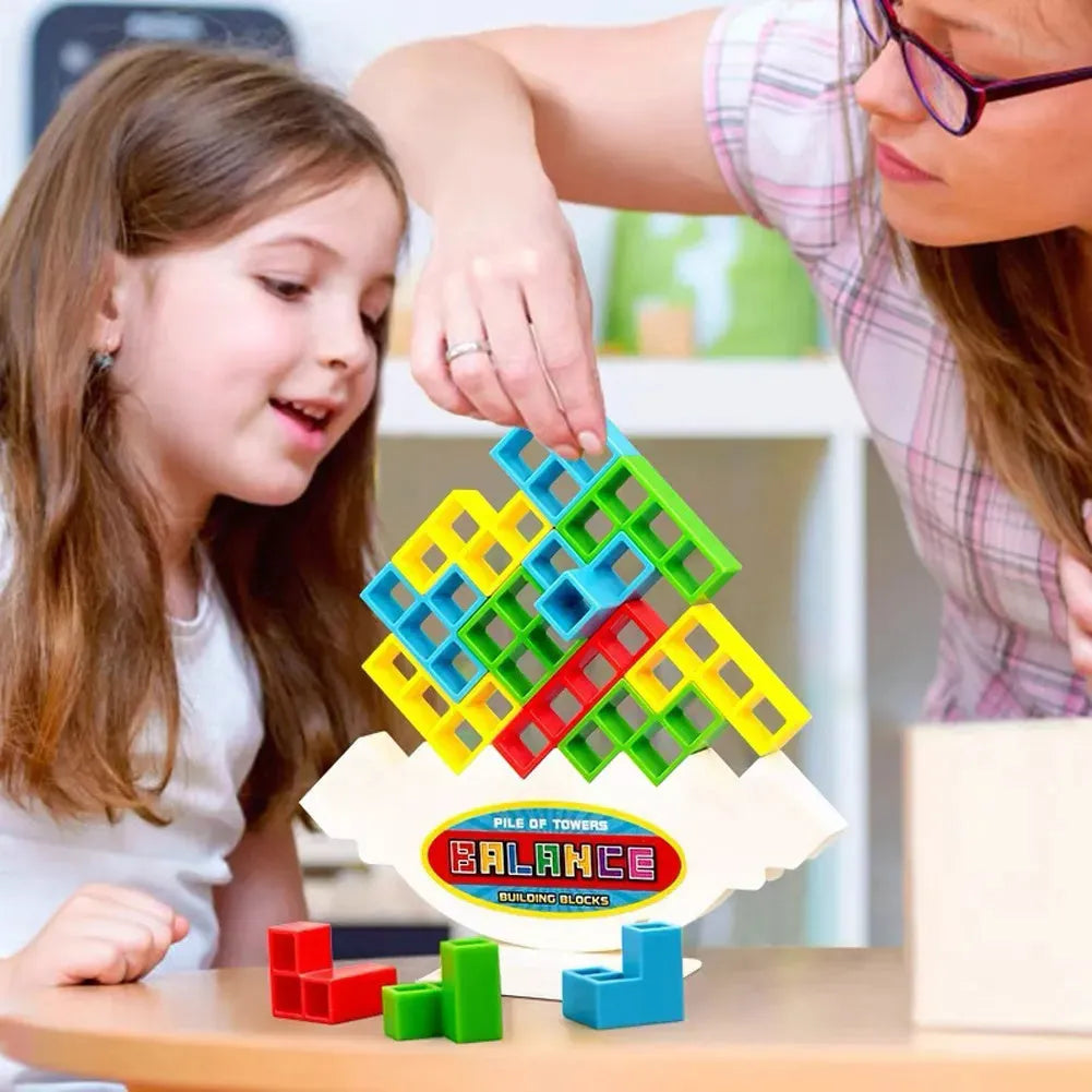 Plastic balance stacking game with colourful building blocks on 26.5cm square chassis