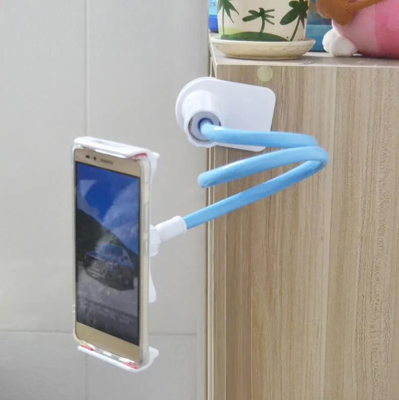 Black bedside phone mount with long flexible arm and saddle base holding a mobile phone.