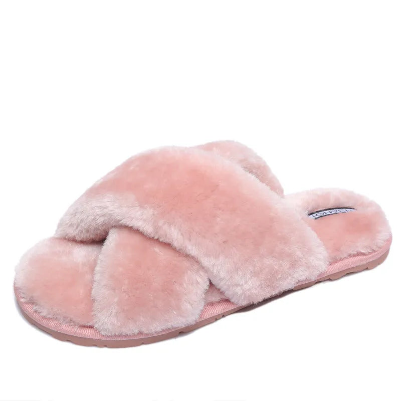 Cross open-toe fur slippers in various colours on a non-slip, patterned sole.