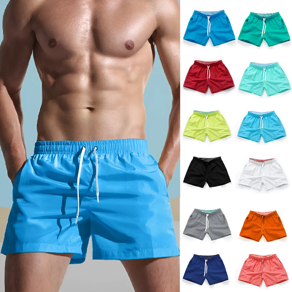 Men's polyester straight-leg surf shorts on a hanger, available in multiple solid colours.