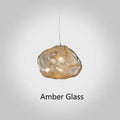 Modern decorative chandelier with glass shade and fabric design, available in amber, clear, or smoke grey.