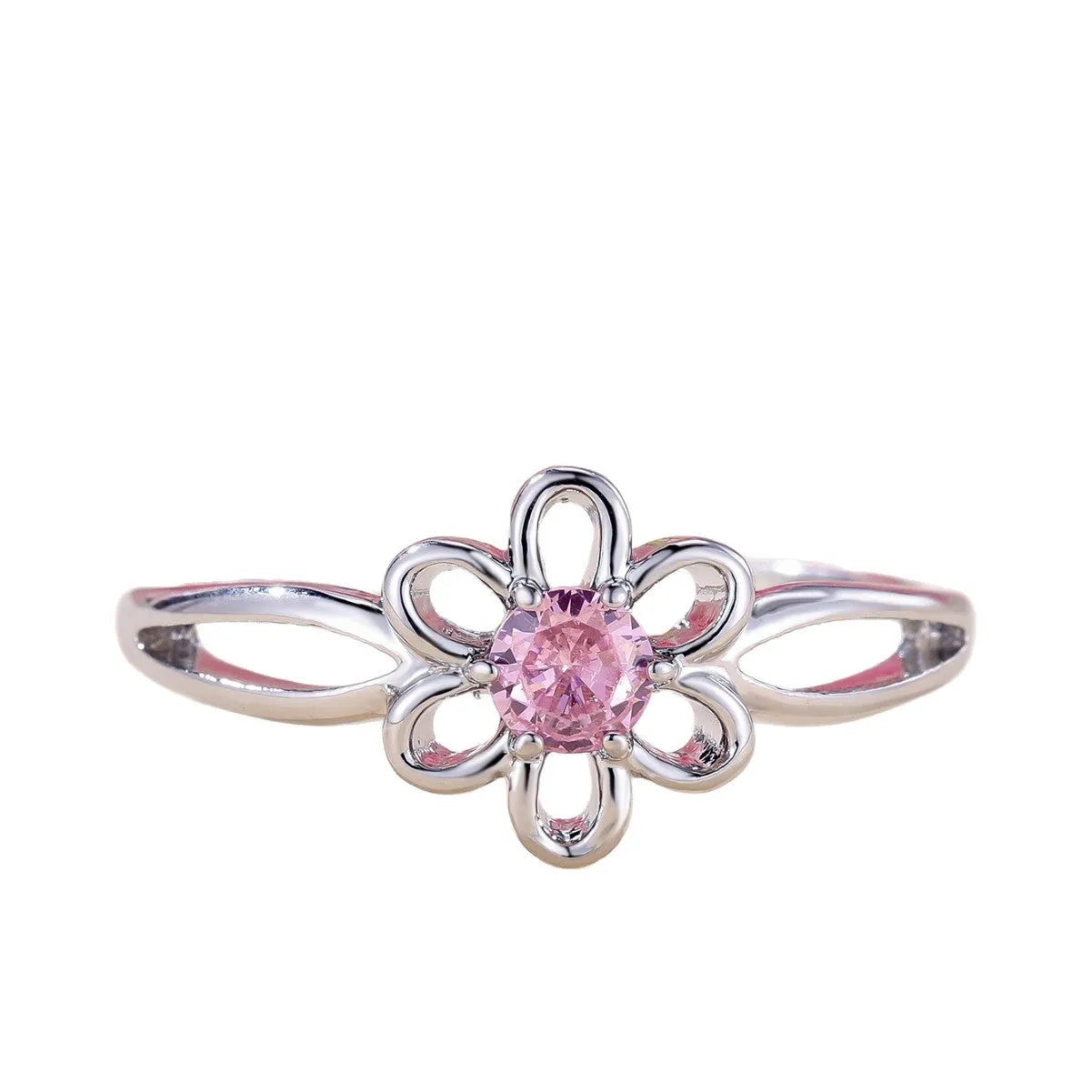 Lady's copper flower hollowed ring with electroplated finish in white gold powder colour on white background