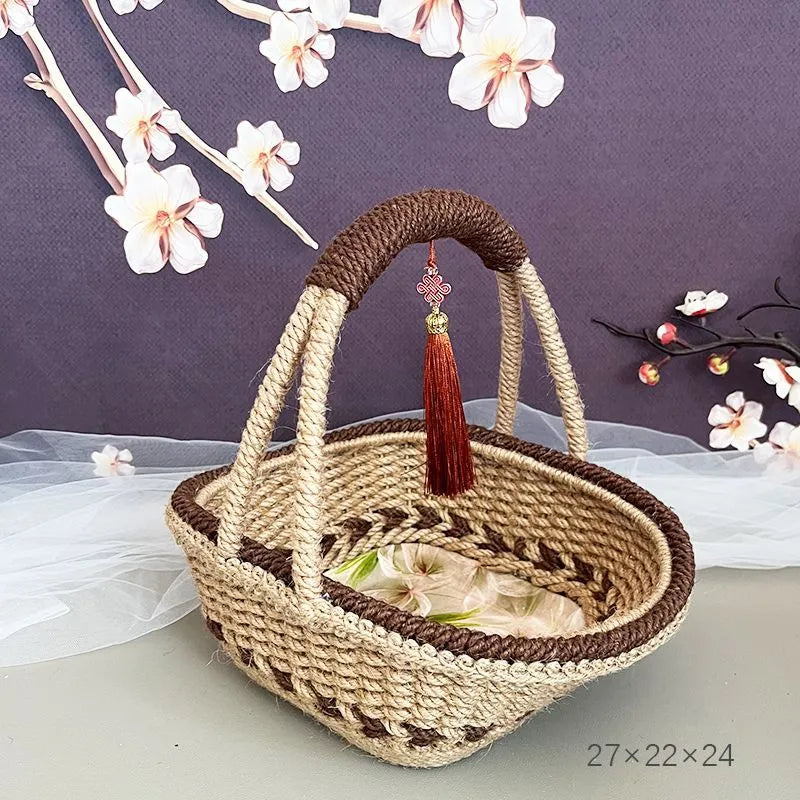 Hand-woven rustic straw basket in coffee brown colour, measuring 19cm by 12cm.