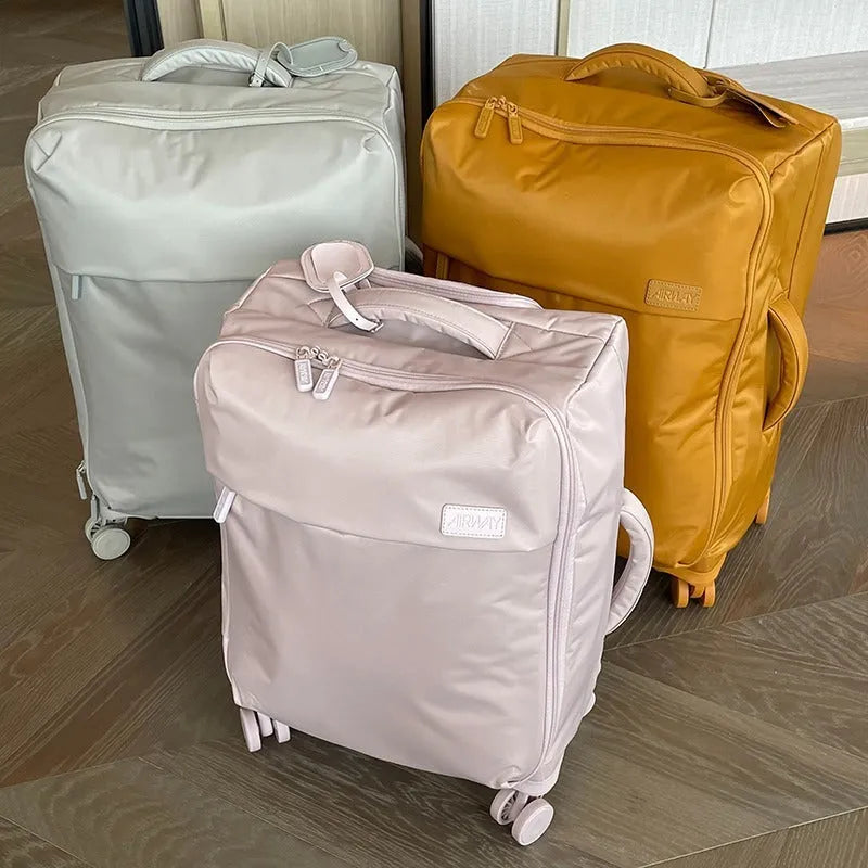 20-inch ultra-light waterproof Oxford cloth suitcase in bluestone green with universal wheels