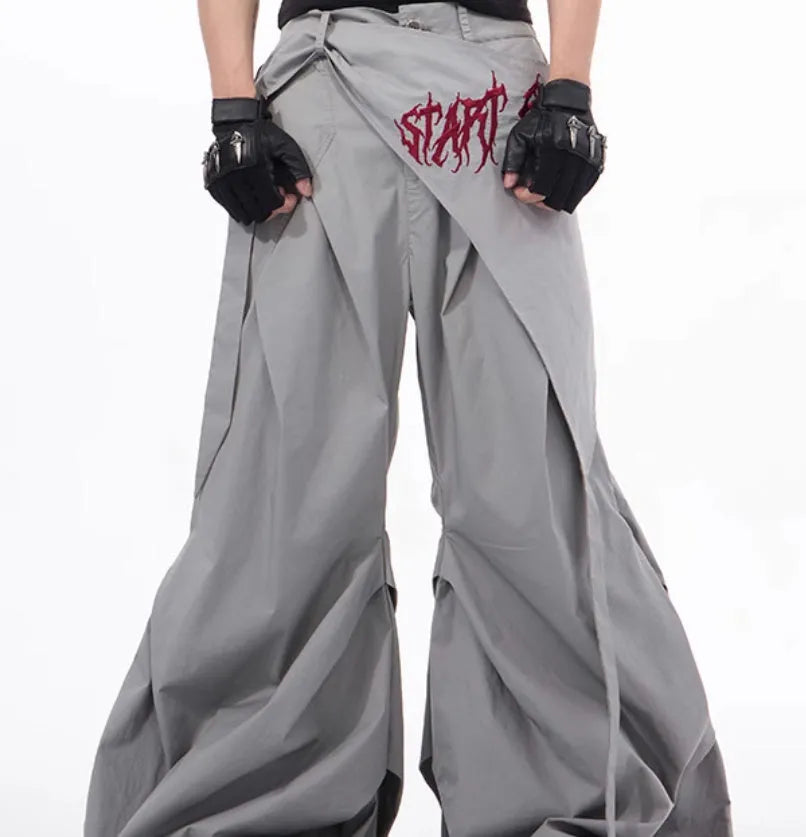 Korean-style black wide-leg summer function pants for boys displayed flat