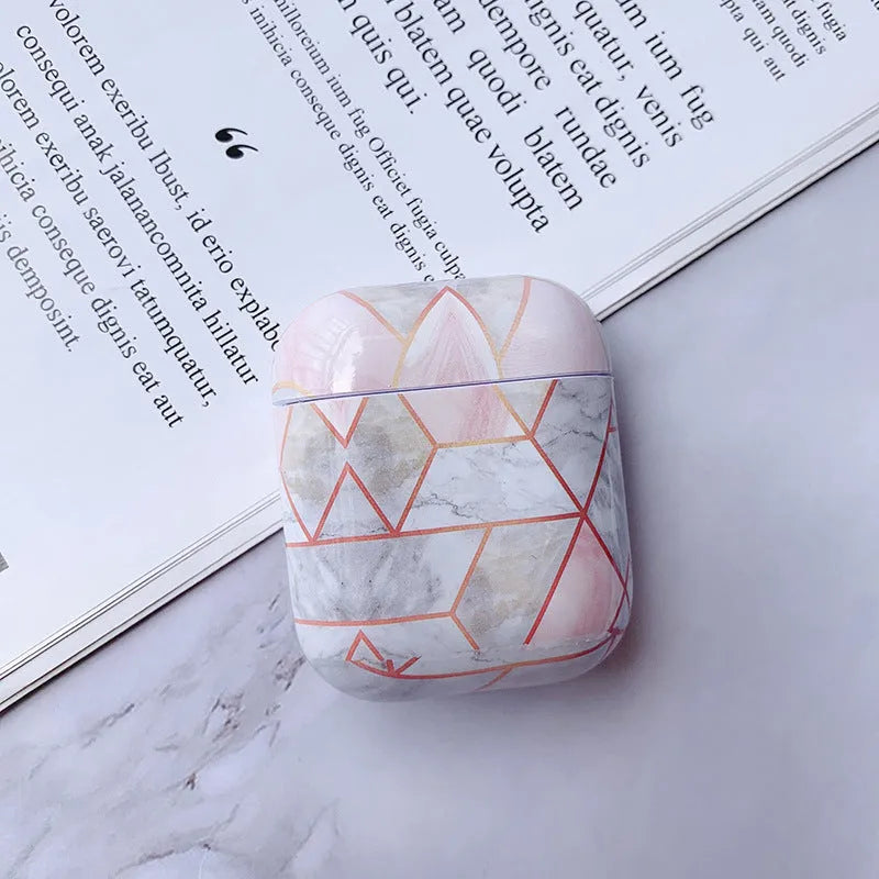 White marble crack pattern hard plastic protective case for Apple AirPods 1 and 2 charging box.