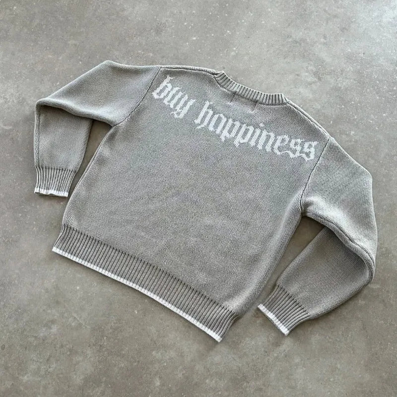 Grey loose-fitting jacquard knitwear pullover coat with long sleeves for autumn winter wear.