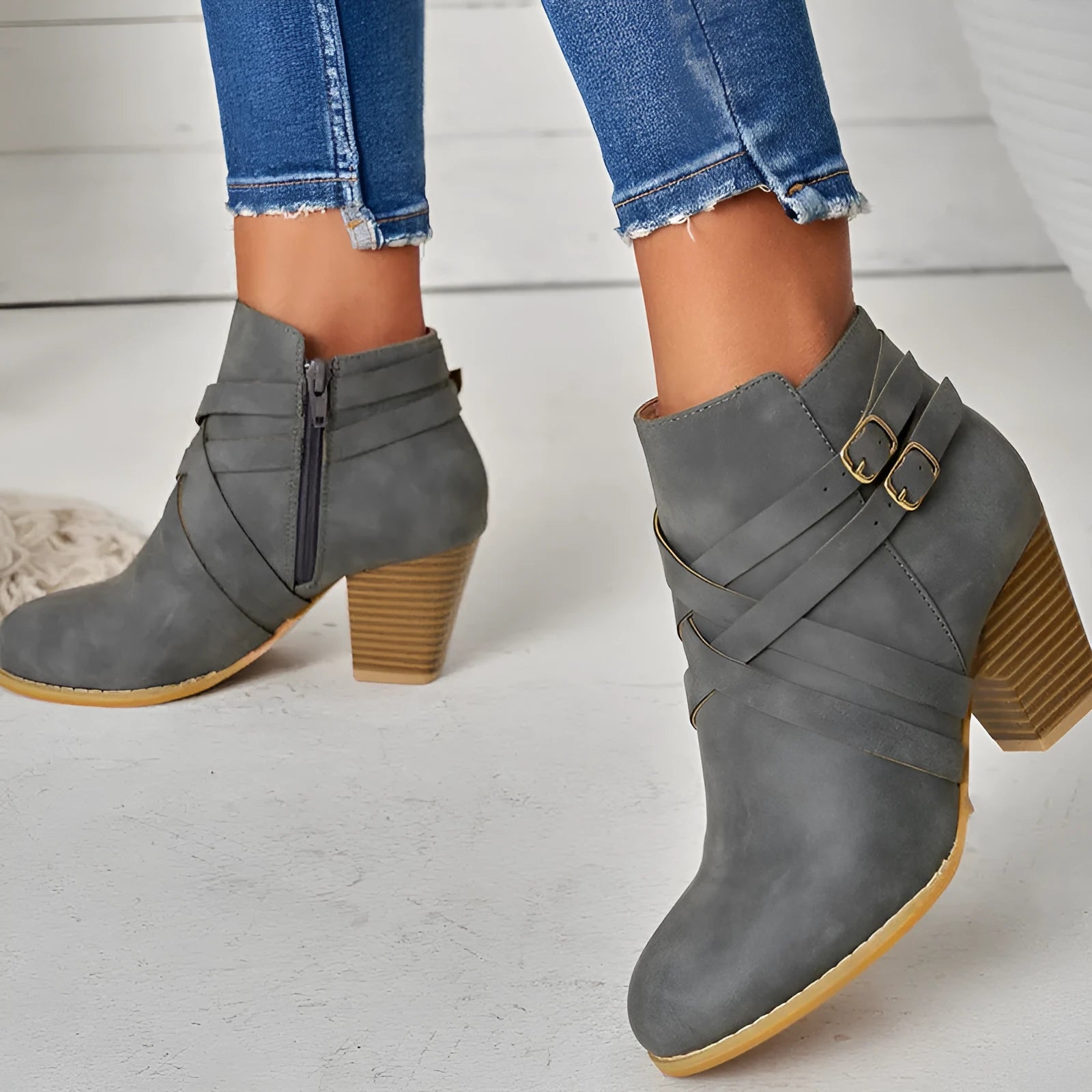 Plus size women's short boot with a 7cm stout heel and side zipper in black.