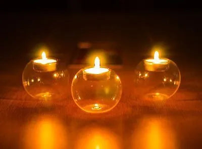 Round clear hollow glass candle holder for hot glass craft on a table