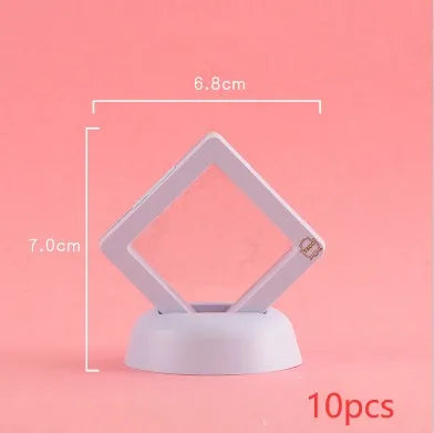 Transparent 3D floating display case holding a coin, with black and white size options