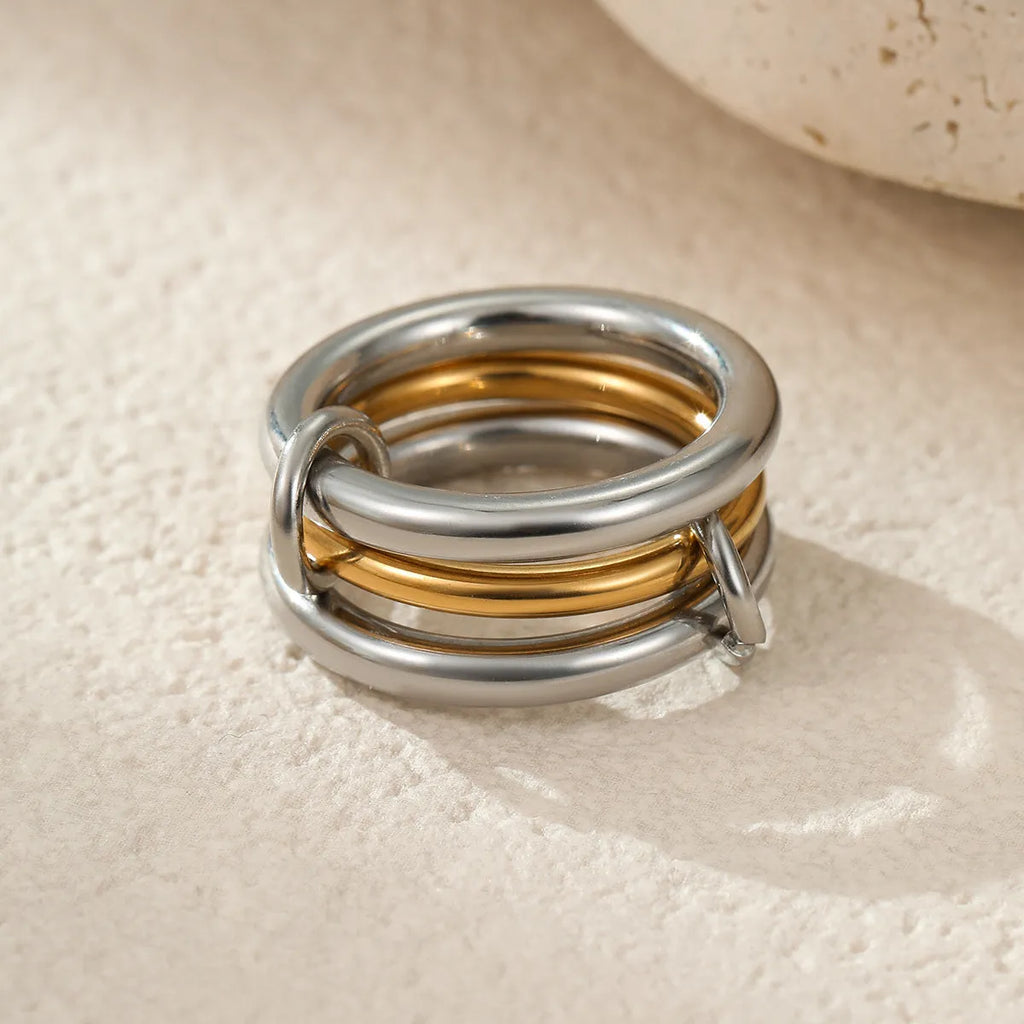 Stacked stainless steel rings with 18K gold plating in colour-matched set for women